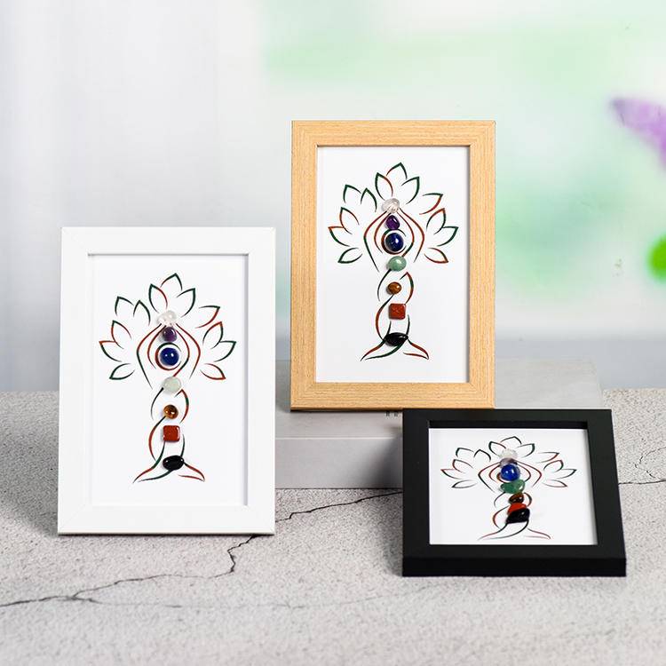 Seven chakras tree-like crystal stone picture frame on the table
